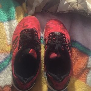 Red adidas shoes